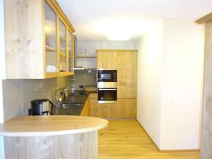 A kitchen or kitchenette at Ferienwohnung Oberdamüls Még 7 kép