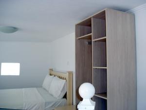 Postel nebo postele na pokoji v ubytování Villa Pegasos