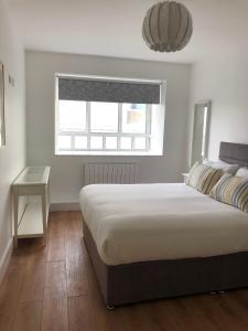 Un ou plusieurs lits dans un hébergement de l'établissement The Eyre Square Townhouse