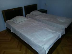 Letto o letti in una camera di Guesthouse Kiko