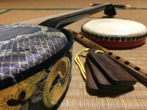 a pair of drums sitting on top of a table at Shimaotoya in Iriomote