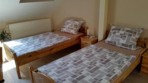 Postel nebo postele na pokoji v ubytování Gästezimmer Langenselbold
