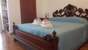 Posteľ alebo postele v izbe v ubytovaní Grazioso e comodo appartamento al centro