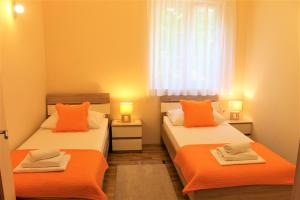 Postel nebo postele na pokoji v ubytování Guest House Ankora