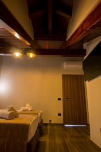 Postel nebo postele na pokoji v ubytování Hotel Pandora Residence