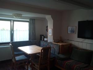 Telewizja i/lub zestaw kina domowego w obiekcie Apartment Waldhaus Opitz