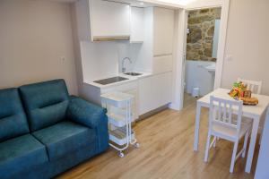 Kuchyňa alebo kuchynka v ubytovaní A Bughina apartamentos