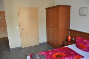 Postelja oz. postelje v sobi nastanitve Hotel Ratskeller