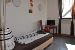 TV in/ali zabaviščno središče v nastanitvi Hotel Ratskeller