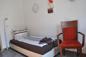 Postelja oz. postelje v sobi nastanitve Hotel Ratskeller