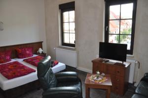 TV in/ali zabaviščno središče v nastanitvi Hotel Ratskeller