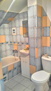 Kúpeľňa v ubytovaní Apartament w Giżycku przy plaży