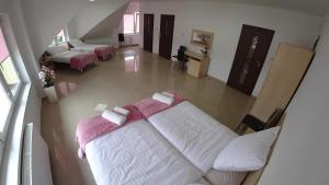 Posteľ alebo postele v izbe v ubytovaní Apartamenty Kozienice