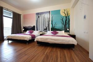 Letto o letti in una camera di Mr.Lee