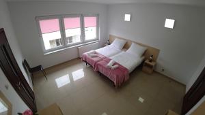 Posteľ alebo postele v izbe v ubytovaní Apartamenty Kozienice