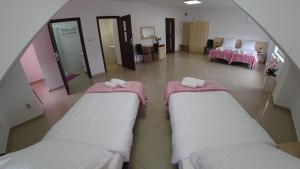 Posteľ alebo postele v izbe v ubytovaní Apartamenty Kozienice