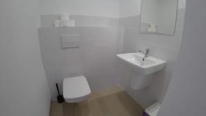 Kúpeľňa v ubytovaní Apartamenty Kozienice