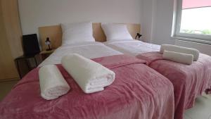 Posteľ alebo postele v izbe v ubytovaní Apartamenty Kozienice