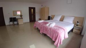Posteľ alebo postele v izbe v ubytovaní Apartamenty Kozienice