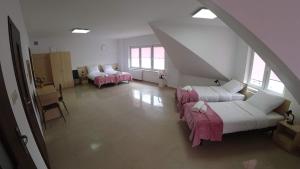 Posteľ alebo postele v izbe v ubytovaní Apartamenty Kozienice