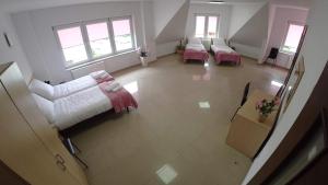Posteľ alebo postele v izbe v ubytovaní Apartamenty Kozienice
