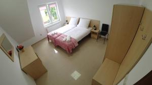 Posteľ alebo postele v izbe v ubytovaní Apartamenty Kozienice