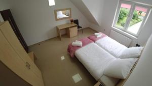 Posteľ alebo postele v izbe v ubytovaní Apartamenty Kozienice