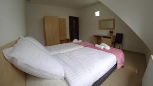 Posteľ alebo postele v izbe v ubytovaní Apartamenty Kozienice