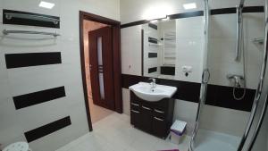 Kúpeľňa v ubytovaní Apartamenty Kozienice + 37 fotografií