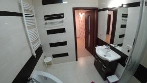 Kúpeľňa v ubytovaní Apartamenty Kozienice