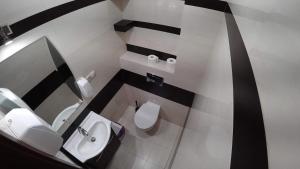 Kúpeľňa v ubytovaní Apartamenty Kozienice