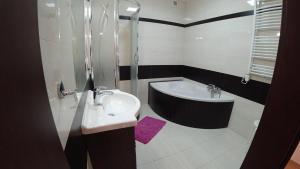 Kúpeľňa v ubytovaní Apartamenty Kozienice