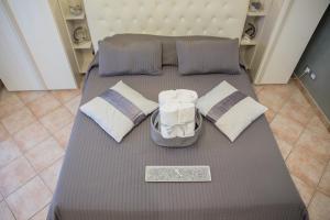 Säng eller sängar i ett rum på Villa Erasi