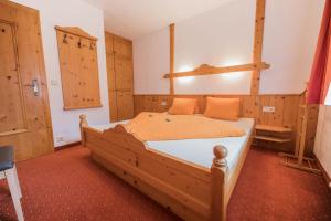 Katil atau katil-katil dalam bilik di Ferienheim Gasteig