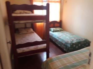 Ein Bett oder Betten in einem Zimmer der Unterkunft Apartamento Ed Jany Fortaleza