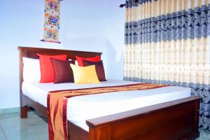 Ένα ή περισσότερα κρεβάτια σε δωμάτιο στο Seasand Holiday Home