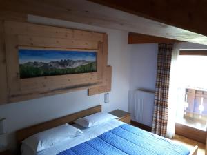 Postel nebo postele na pokoji v ubytování Garni Eden Bed and breakfast