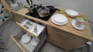 Kuchyňa alebo kuchynka v ubytovaní Apartamenty Kozienice