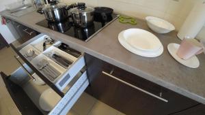 Kuchyňa alebo kuchynka v ubytovaní Apartamenty Kozienice