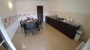 Kuchyňa alebo kuchynka v ubytovaní Apartamenty Kozienice