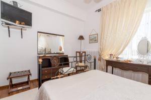 Postel nebo postele na pokoji v ubytování Amalia Country House