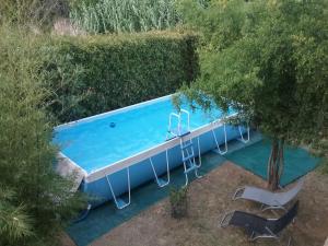 The swimming pool at or close to Locazione turistica La Ginestra