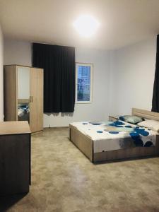 Postel nebo postele na pokoji v ubytování Batumi Hotel