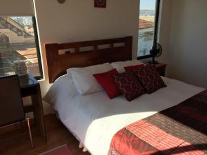 Rúm í herbergi á B&B Hostel CasaMoro