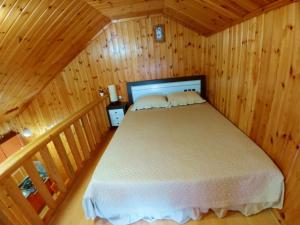 Postel nebo postele na pokoji v ubytování Nadeuri Pension