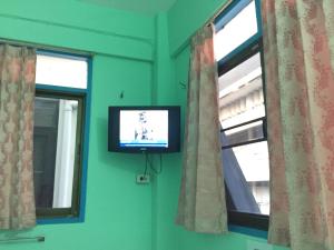 TV a/nebo společenská místnost v ubytování NAT 2 Guest House