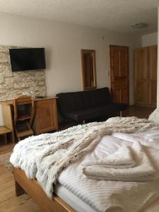 Posteľ alebo postele v izbe v ubytovaní Rustic Inn River 2