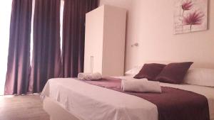 Postel nebo postele na pokoji v ubytování Apartmani Marija Mljet