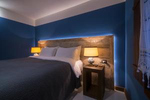 Postel nebo postele na pokoji v ubytování HANI I PAZARIT Boutique Hotel