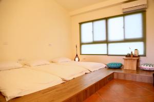Una cama o camas en una habitación de Sapientia